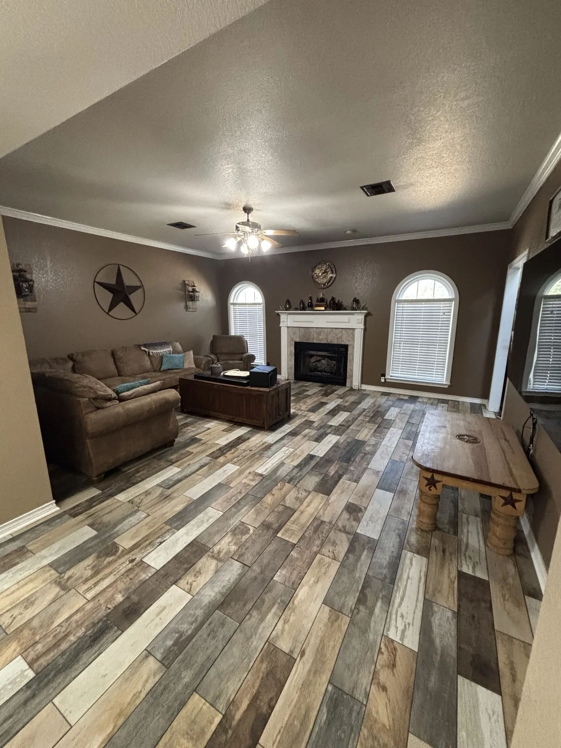 Installed multicolor wood-look flooring in living room